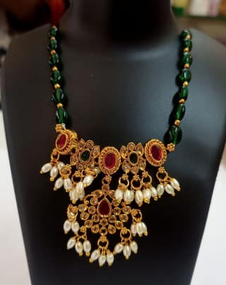 oxidized gold plated traditional necklace set with green beads and pearls