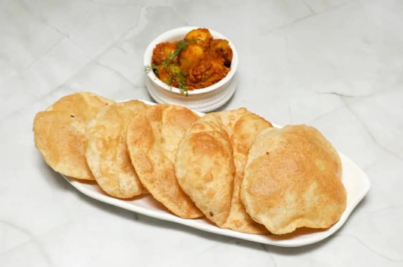 Dum Aloo & 10 Puri