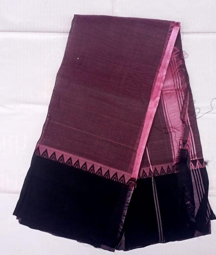 A beautiful handwoven cotton silk saree in a deep shade of aubergine with a black border featuring intricate geometric designs in zari. The saree is perfect for any formal occasion and will make you stand out from the crowd. view 2