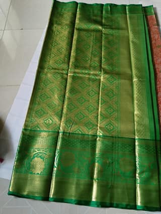 Green and gold zari woven Kanjivaram silk saree