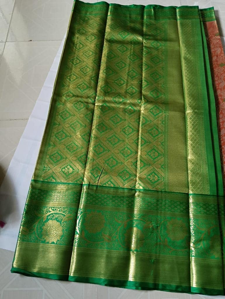 Green and gold zari woven Kanjivaram silk saree
