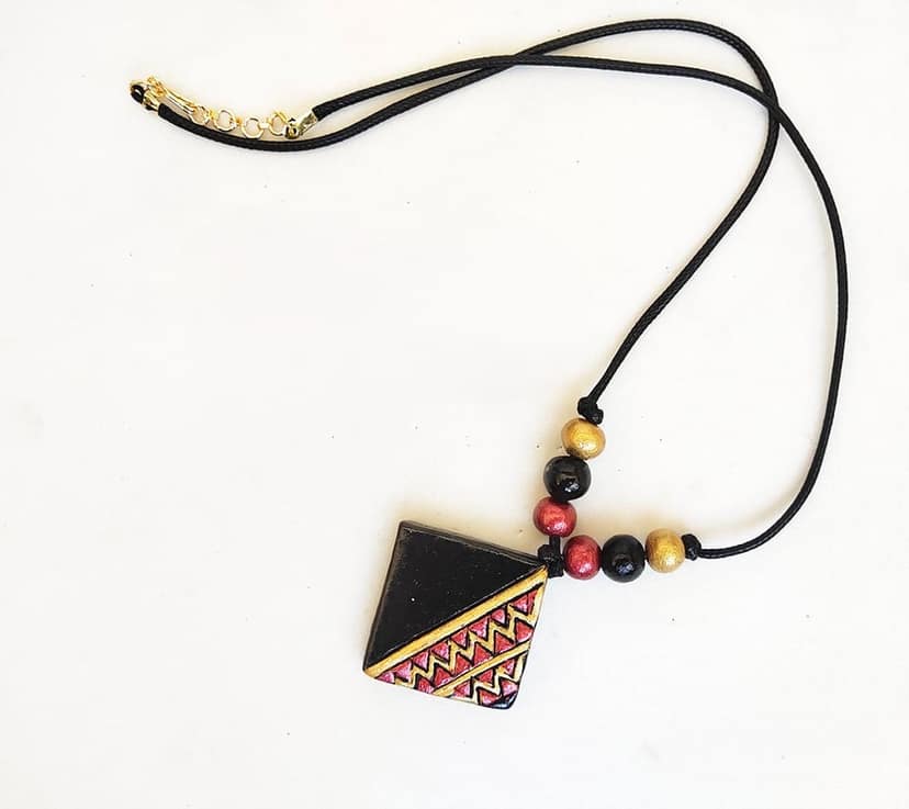 Kathakali pendant necklace set in terracotta view 3