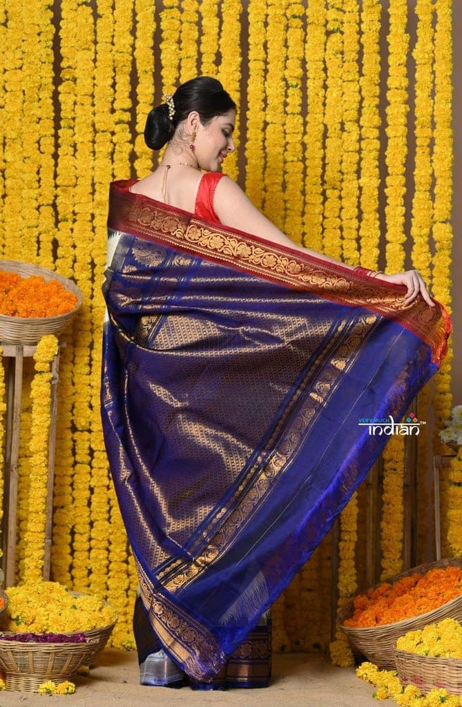 Rajsi~ Handloom Pure Silk Gadwal Saree Handcrafted Zari Pallu In White and Blue Border view 4