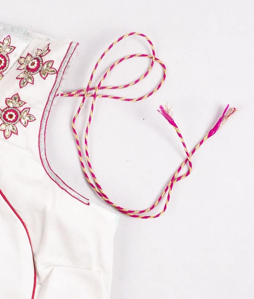 White cotton blouse with hand embroidered silver zari and pink thread work view 2