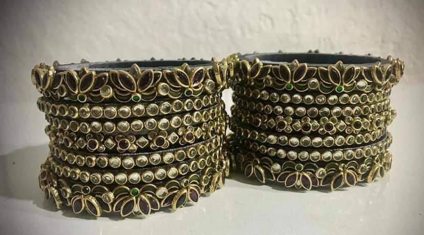 Exquisite Kundan and Pearl Bangle Set with Green Stones view 2