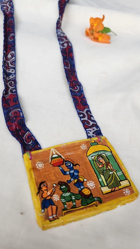 Handmade pendant necklace with hand painted Madhubani art pendant view 3