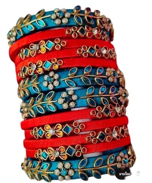 oxidized silver and copper kada bangles with red and blue stones view 2