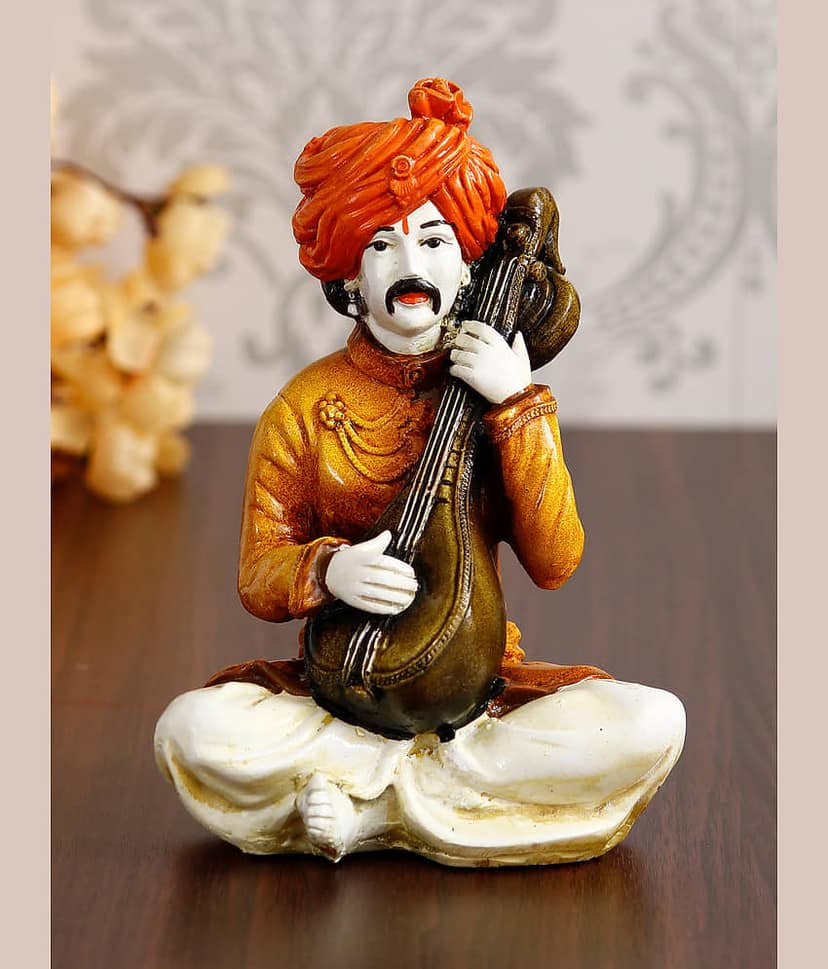 eCraftIndia Orange Rajasthani Musician Playing Sitar Handcrafted Decorative Polyresin Showpiece view 2