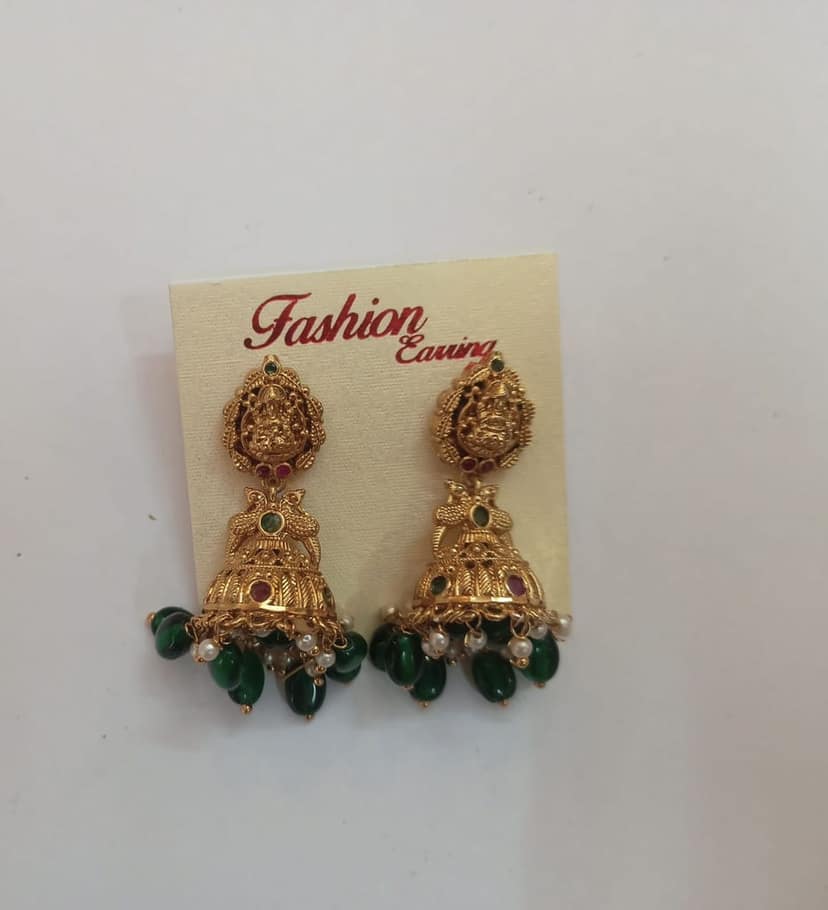 oxidized gold plated traditional jhumka earrings with green beads