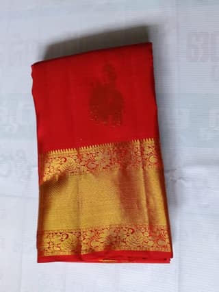 Red Saree With Golden Peacock Butta Work And Green Border