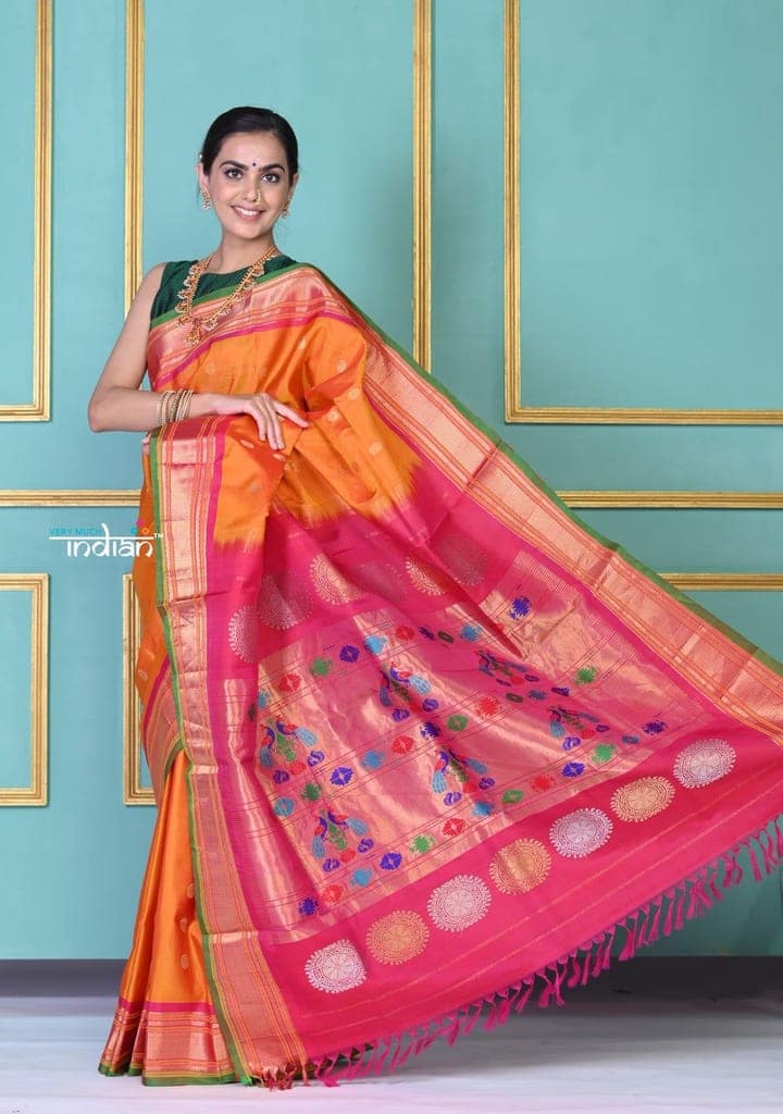 ROYAL WEAVE! Authentic Pure Silk Handloom Turmeric Yellow Maharani Paithani with exclusive Pink Peacock Pallu. view 4