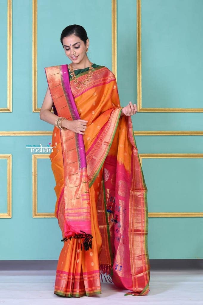 ROYAL WEAVE! Authentic Pure Silk Handloom Turmeric Yellow Maharani Paithani with exclusive Pink Peacock Pallu. view 6