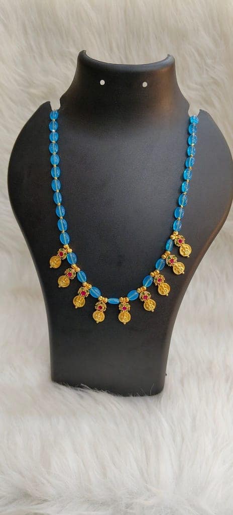 "Stunning Blue Beaded Necklace with Gold-Plated Pendants"