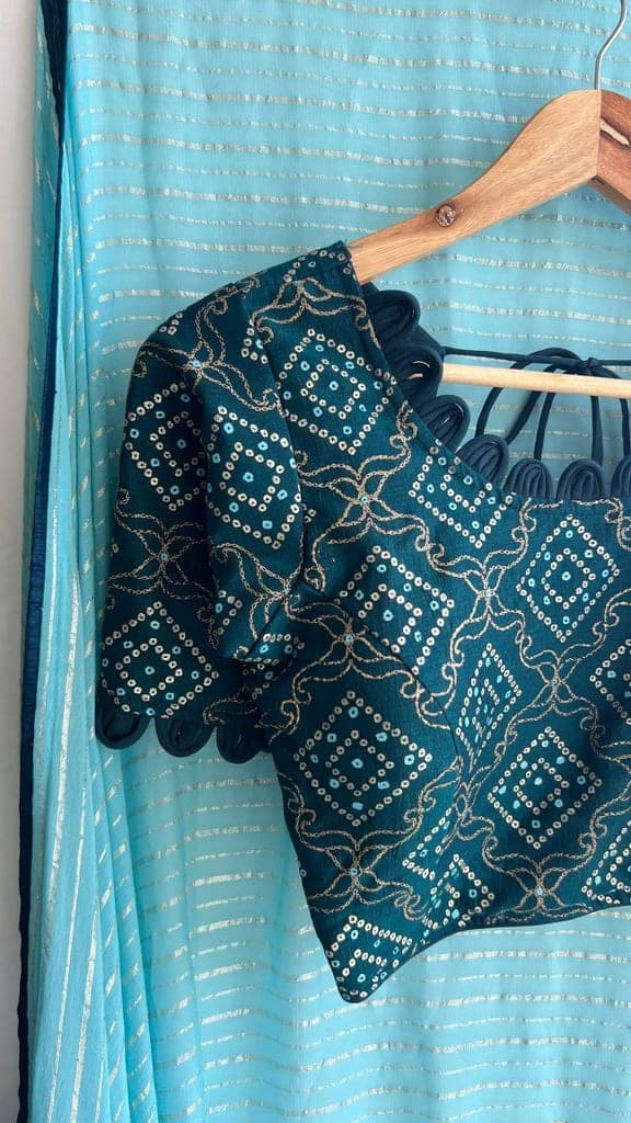 Blue chiffon saree with blue silk handwork blouse view 2
