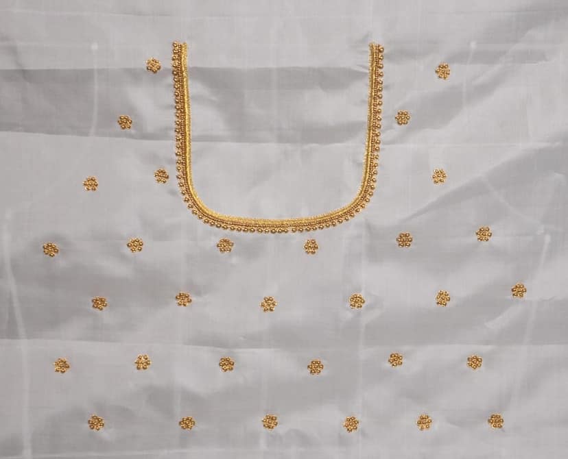 White Saree With Golden Zari Embroidery view 2