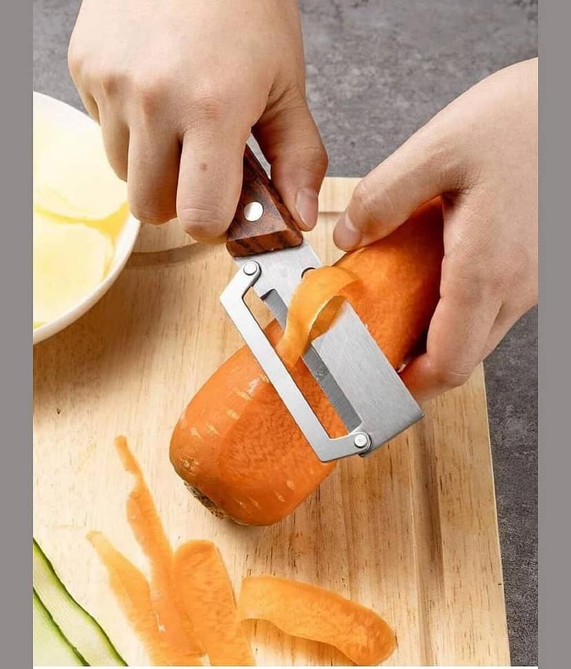 3 in 1 vegetable peeler, fruit peeler, julienne peeler, stainless steel peeler, wooden handle peeler, multifunctional kitchen tool, potato peeler, carrot peeler, cucumber slicer, apple peeler, kitchen accessories view 2