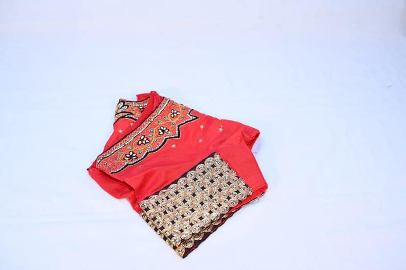 Red and gold embroidered silk blouse with intricate floral designs and zari work view 2