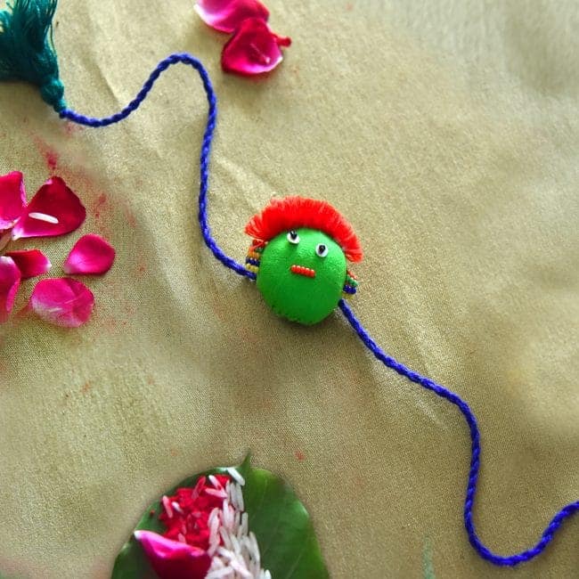 Tribes India Handmade Funny Face Multicolor Rakhi view 2