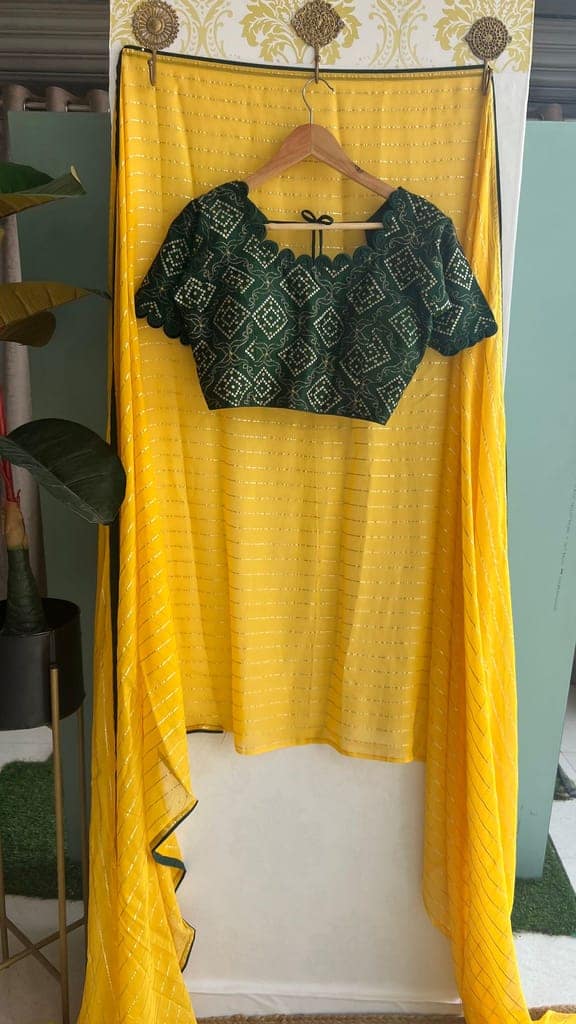 Yellow chiffon saree with green silk handwork blouse view 2