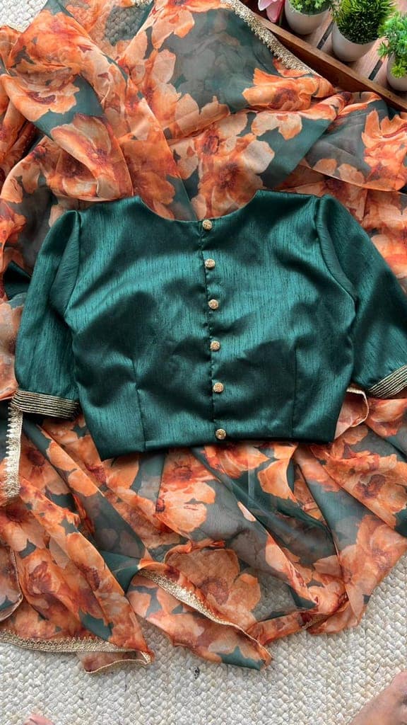 Bottle green floral organza saree with handwork blouse