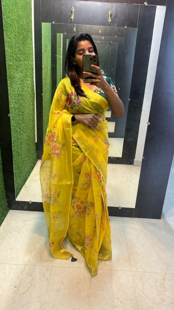 Yellow organza saree with green handwork blouse view 2