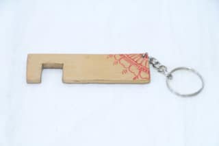 Artisan Wooden Keychain with Red Henna Design