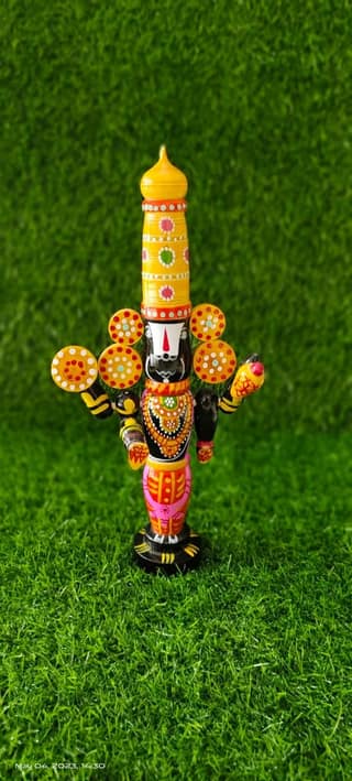 Handcrafted Wooden Deity Figurine - Intricate Design
