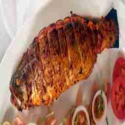 Fish whole grilled (medium size bhetki grilled with exotic toppings)