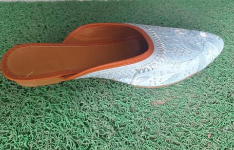 White and silver embroidered slip-on flats with cushioned insole view 2