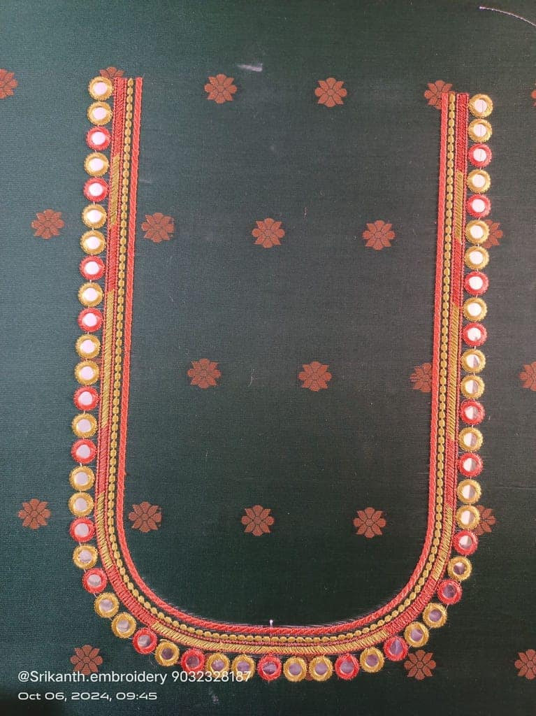 Red and gold embroidered blouse neck design with mirror work