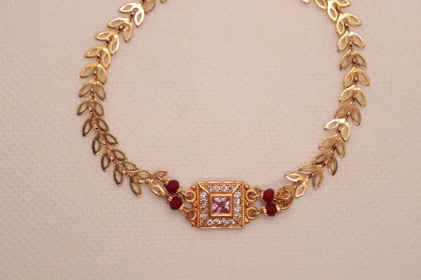 Bracelet with Center Square Pink Stone Surrounded by Clear Stones and Red Stones view 2