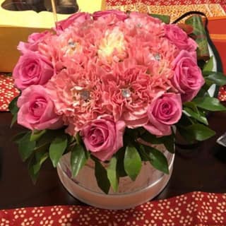 The Blooming Story Pink Bling Kamini Patta Floral Box Arrangement